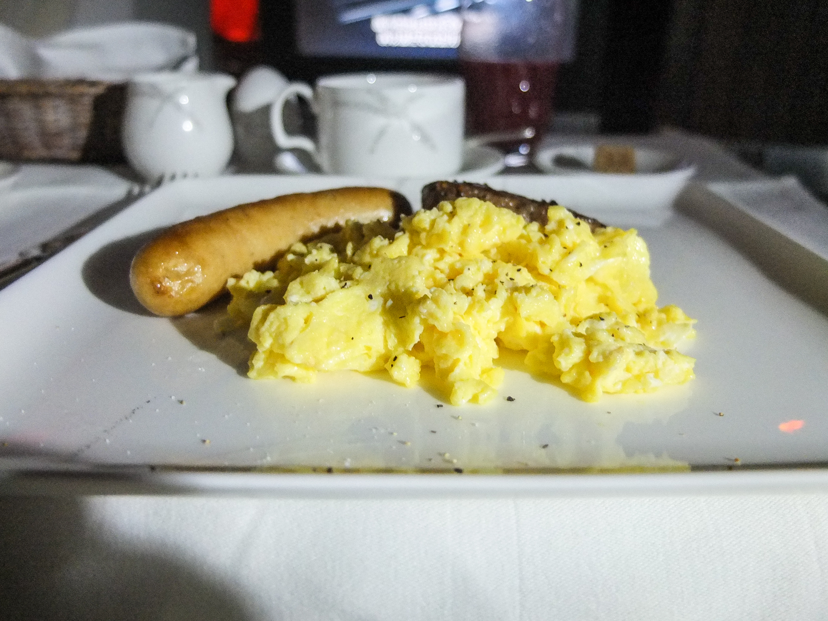 Scrambled eggs and suspicious looking sausage
