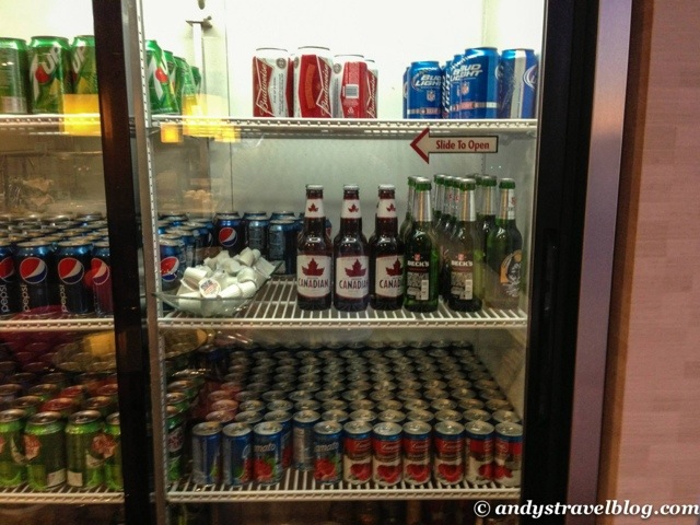 a refrigerator full of beer and cans