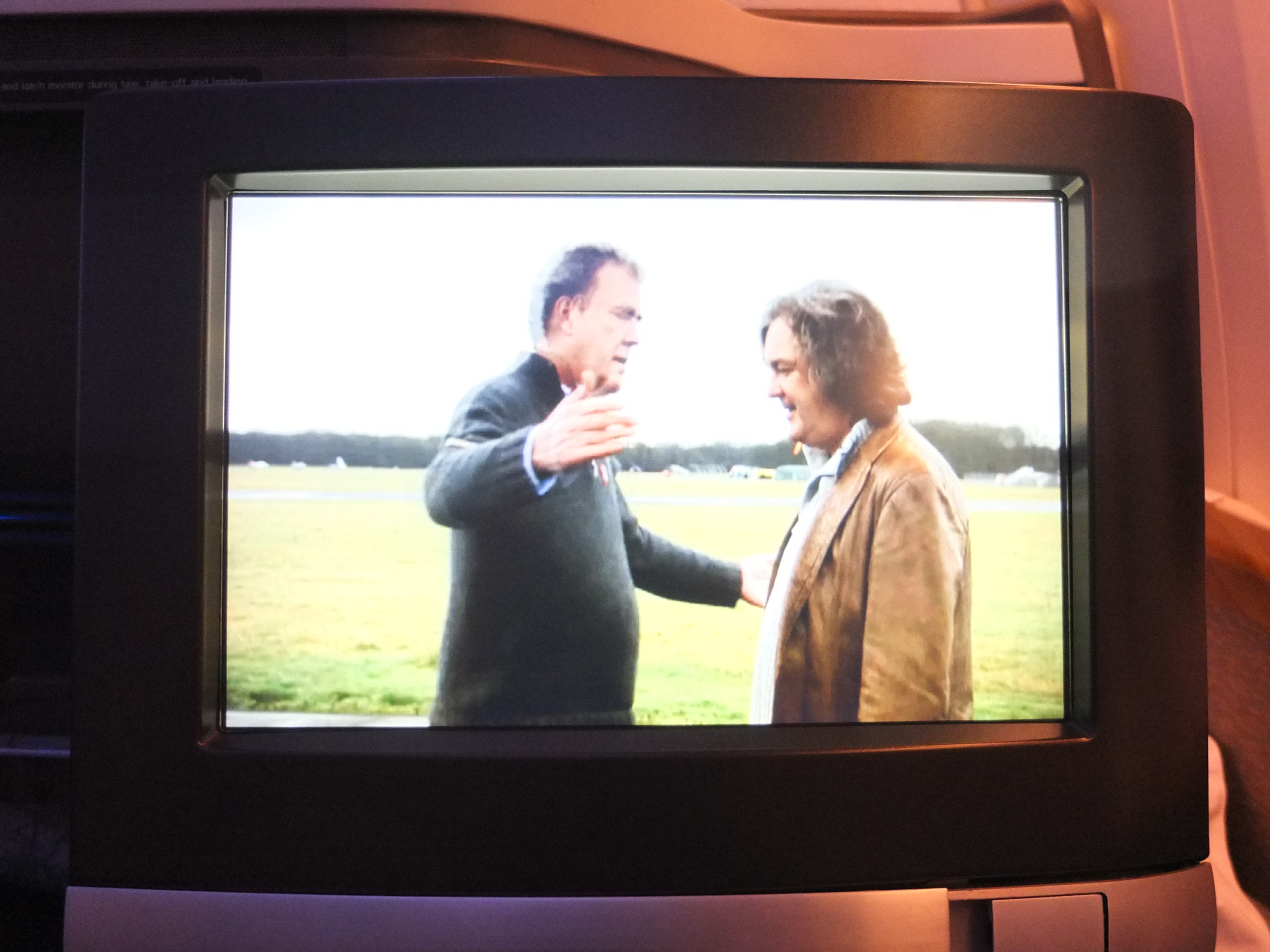 a television screen with two men on it