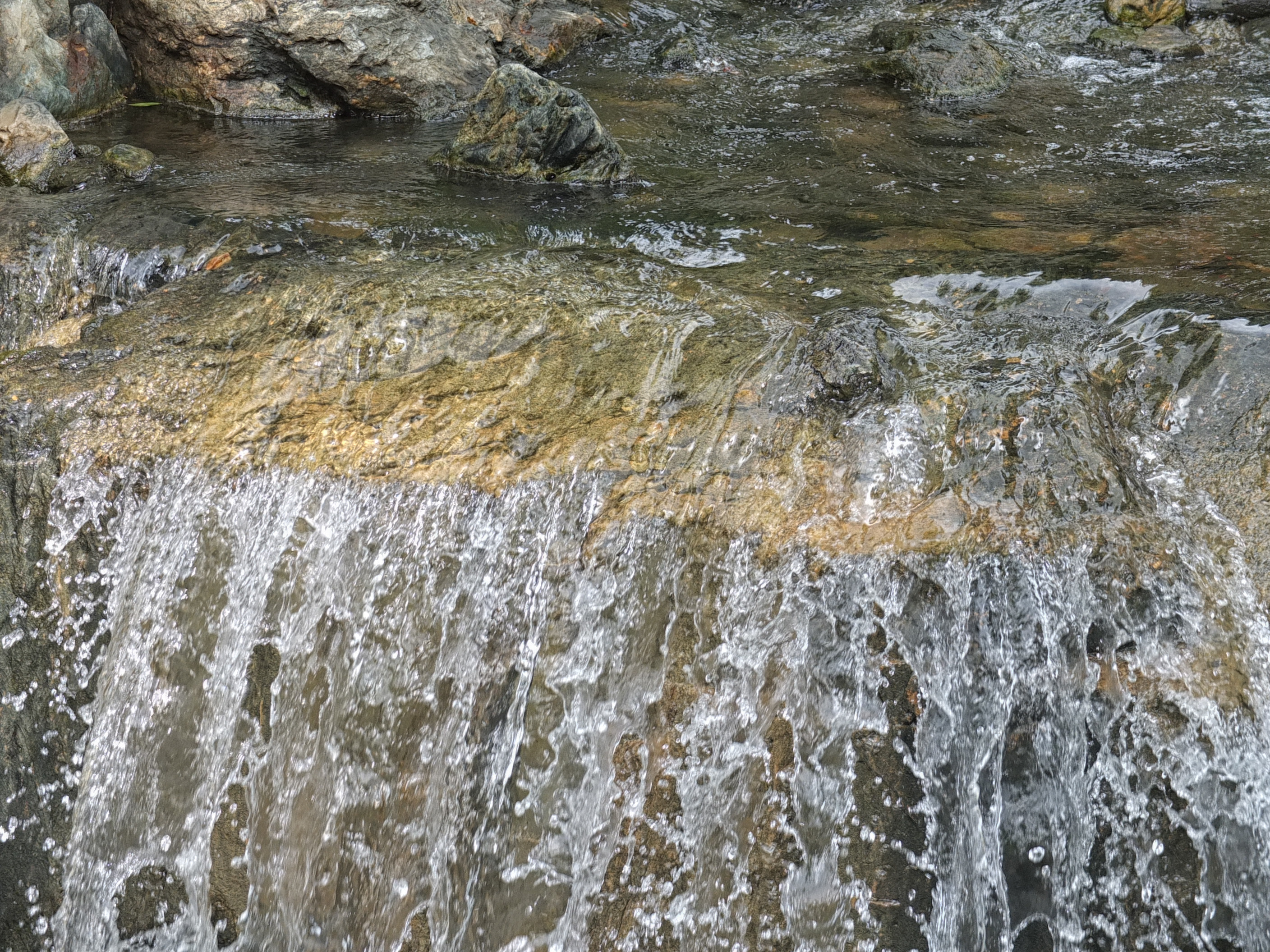 a water flowing over rocks