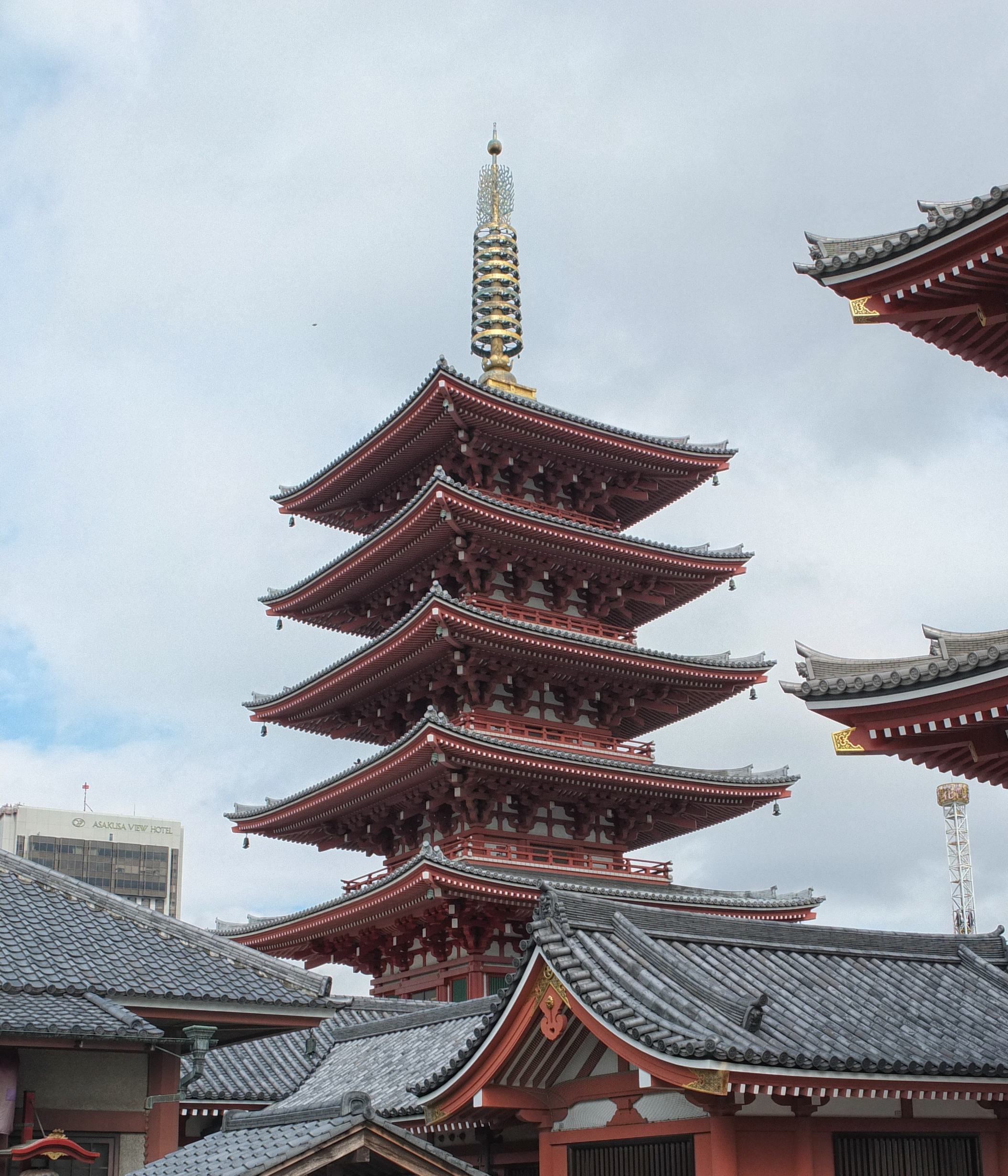 a tall pagoda with a spire