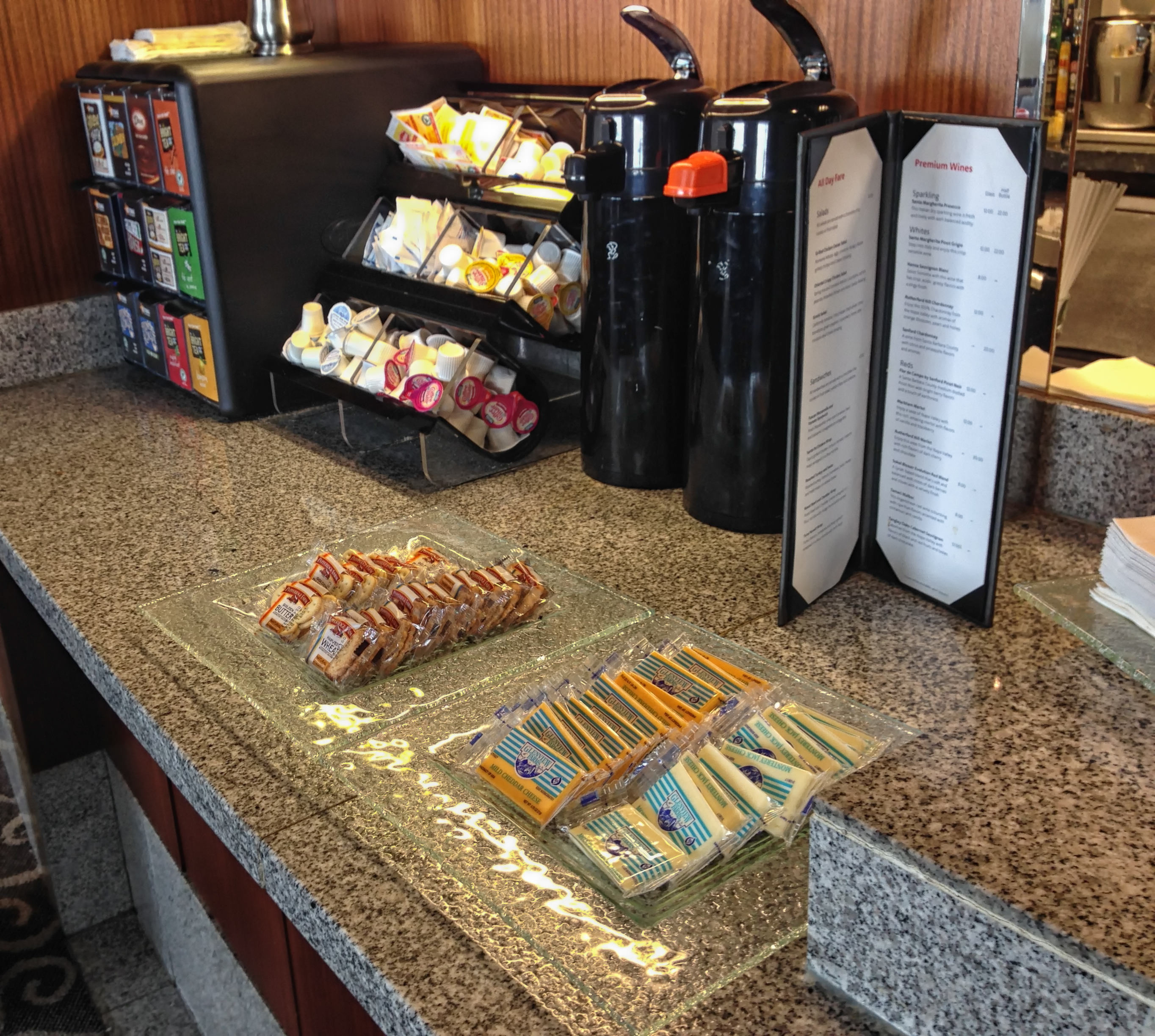 a counter with a variety of condiments and condiments