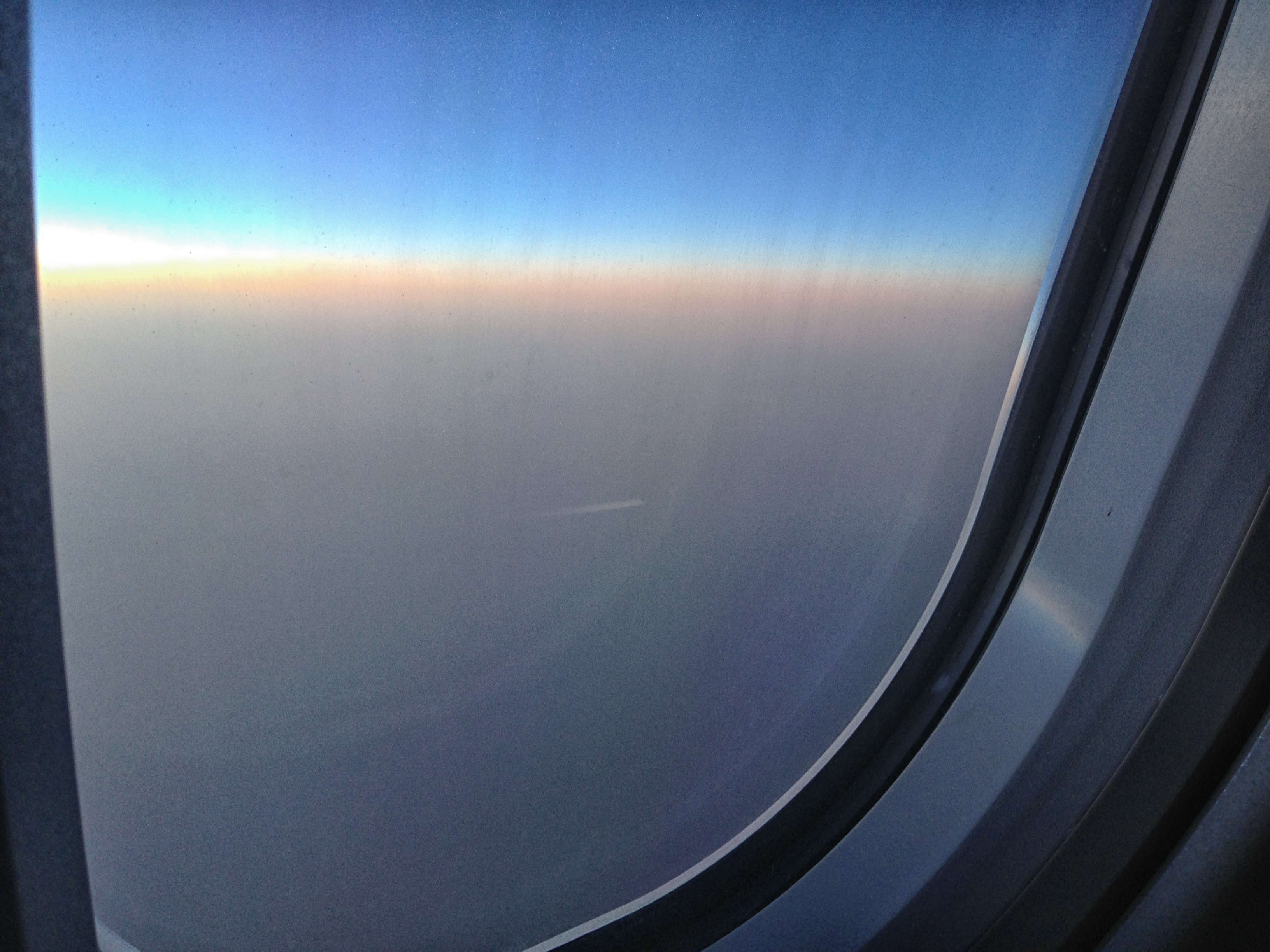 a view of the sky from a plane window