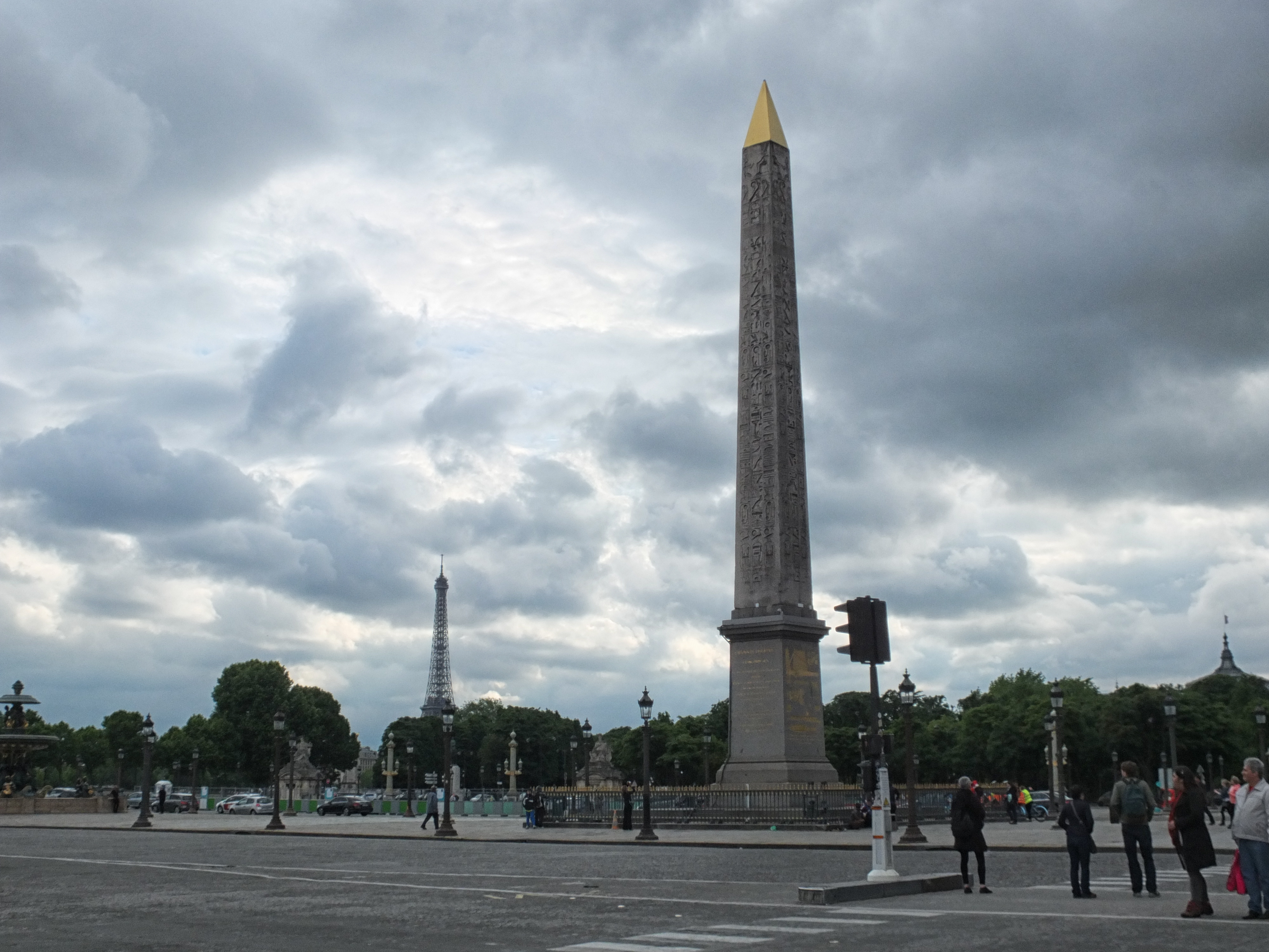 a tall stone obelisk in Place de la Concorde