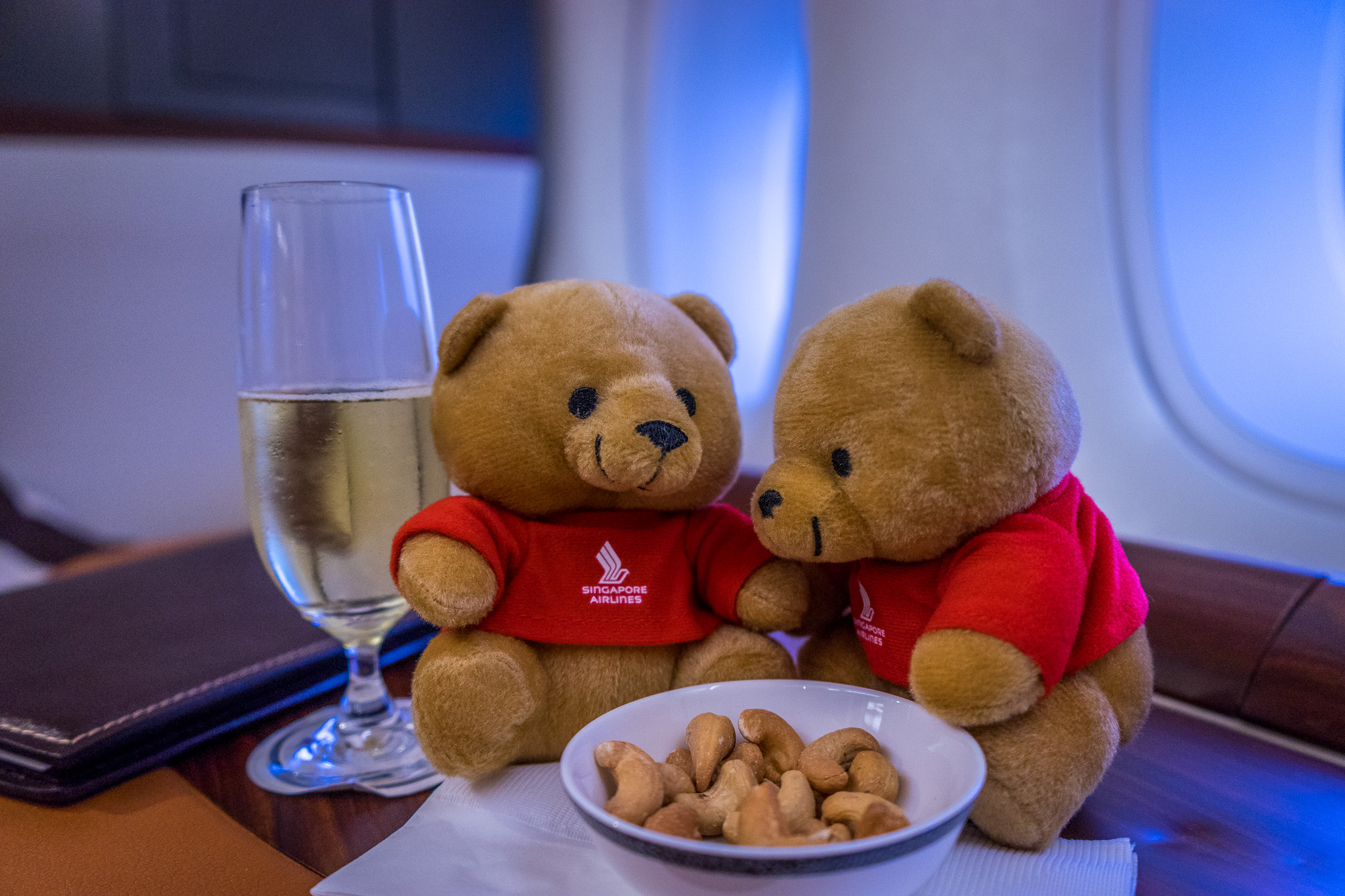 Two bears, champagne, and cashews.  The life.