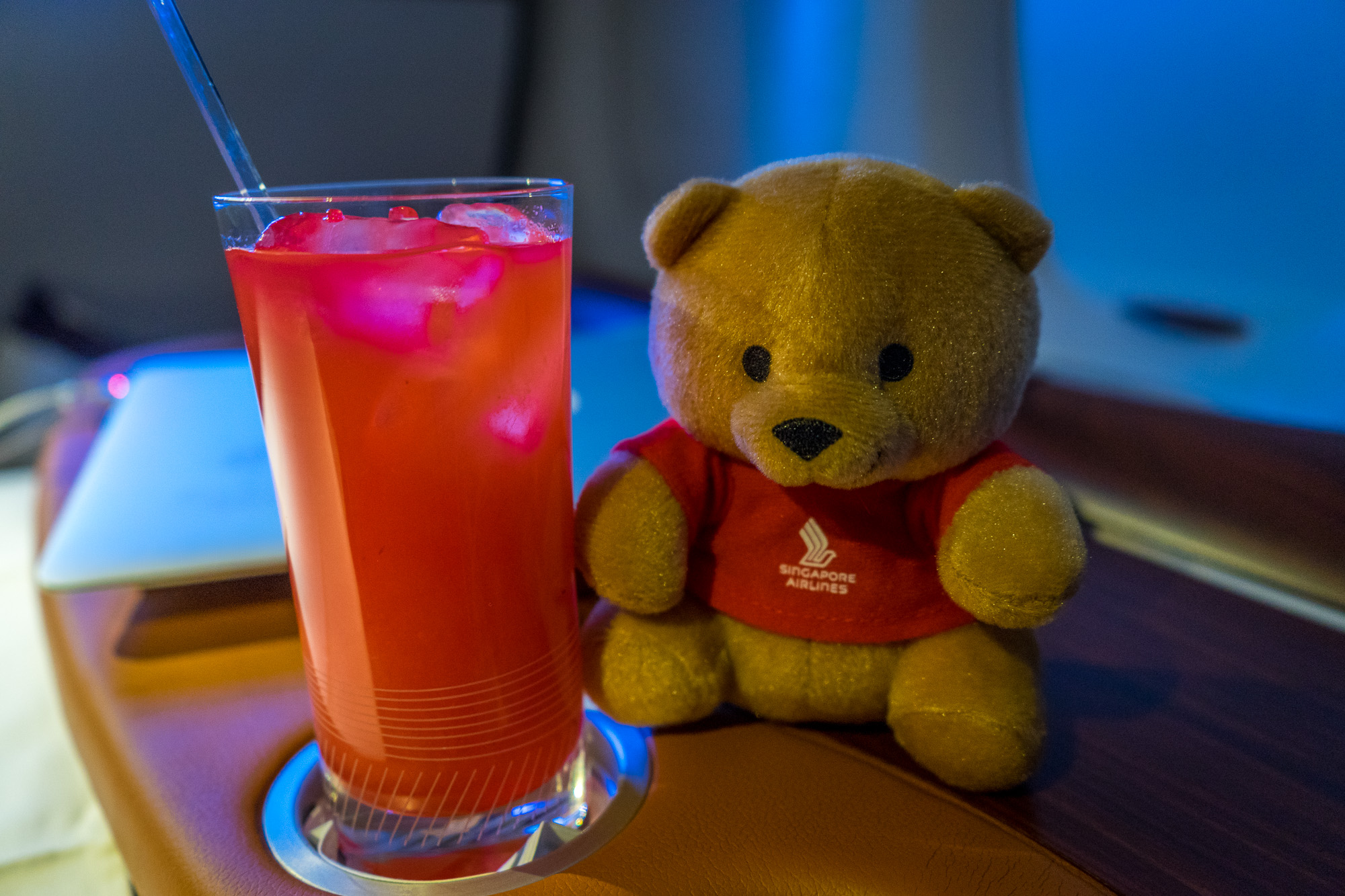 a teddy bear and a drink