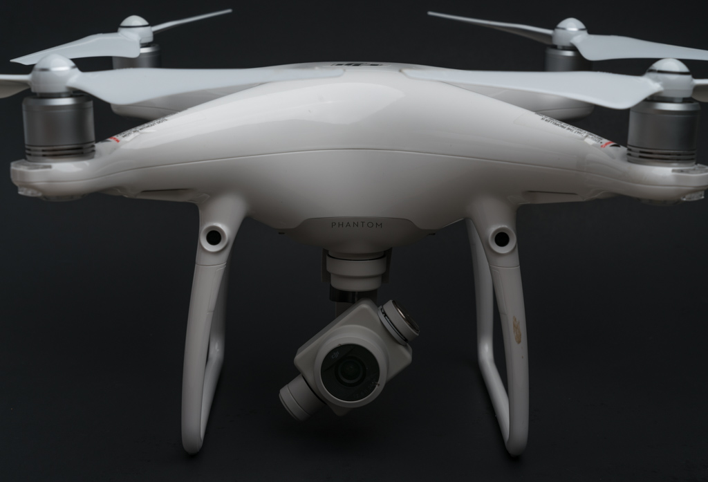 a white drone with a camera
