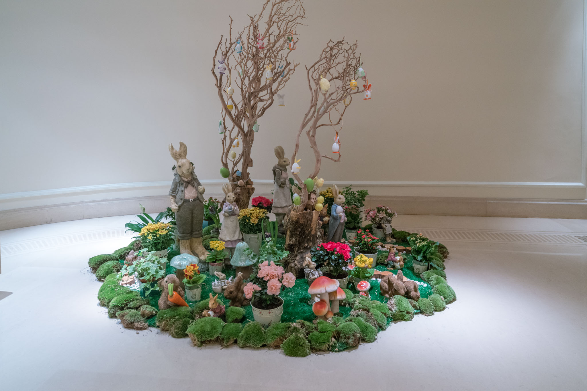 a group of rabbits and trees in a circular arrangement