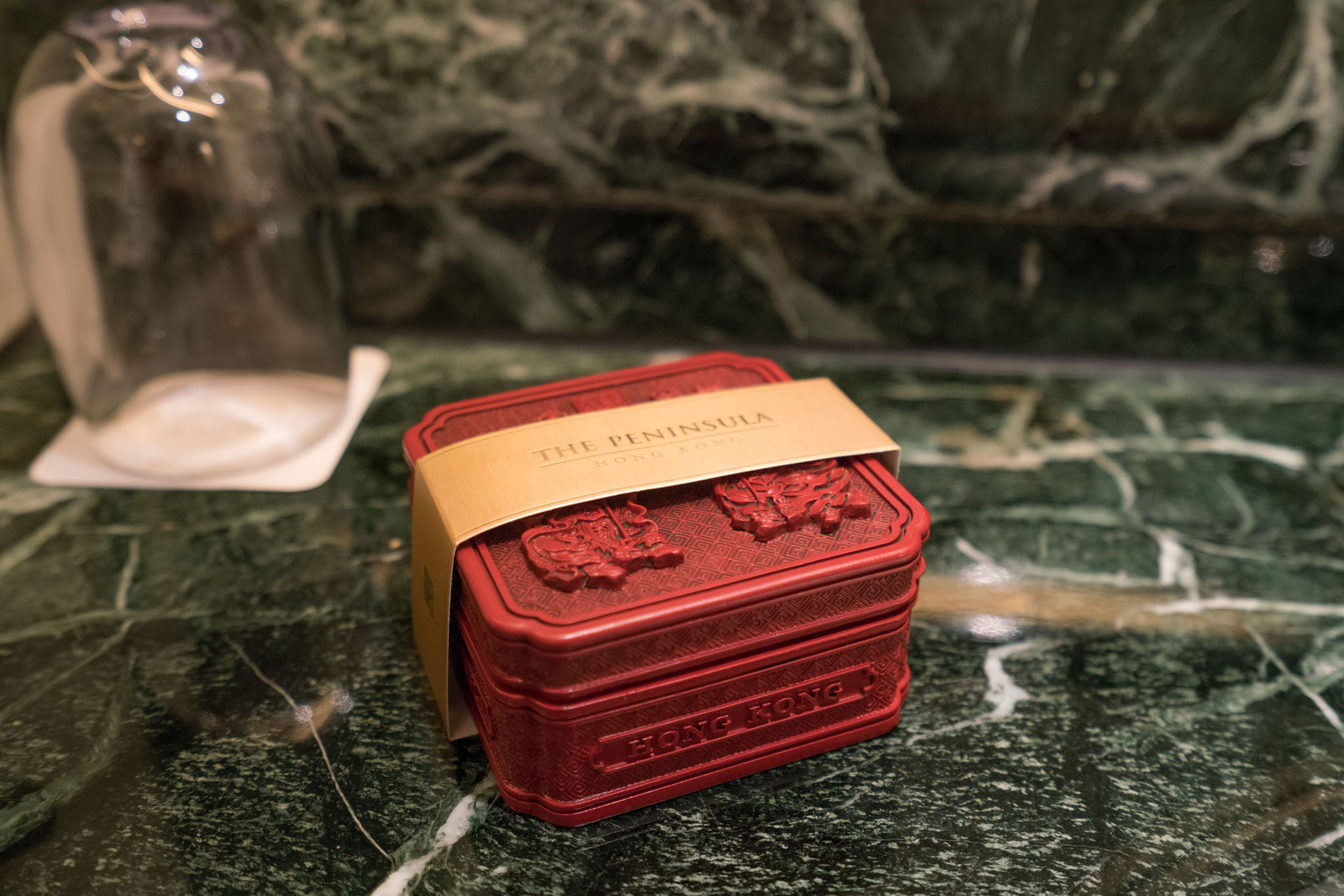 a red box with a gold band on it