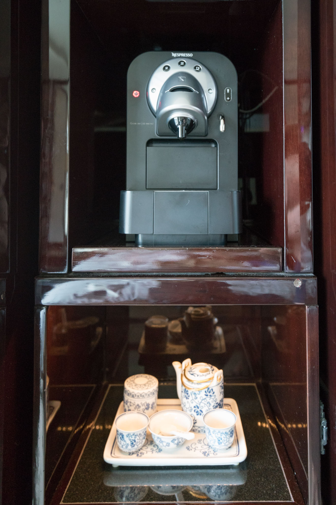 a coffee machine on a shelf