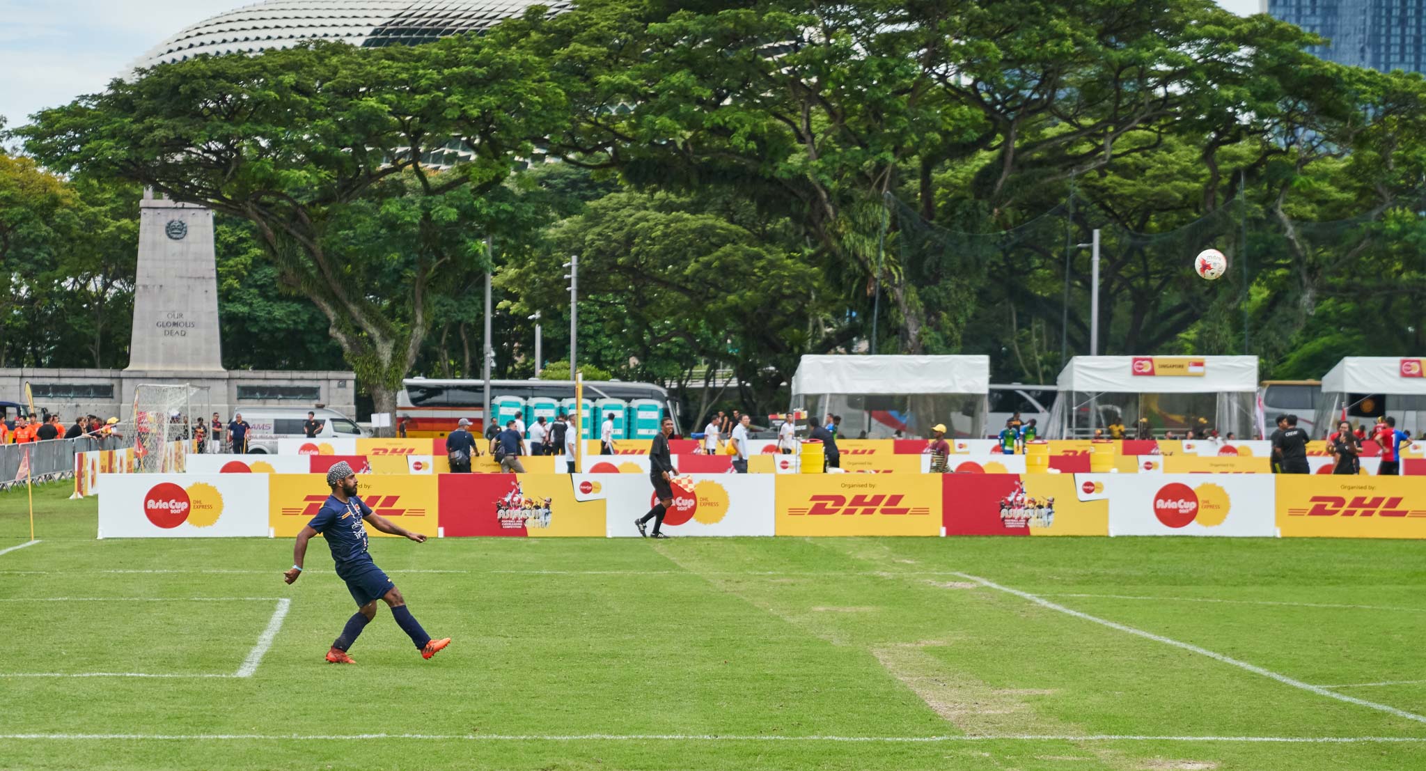 a man on a field playing football