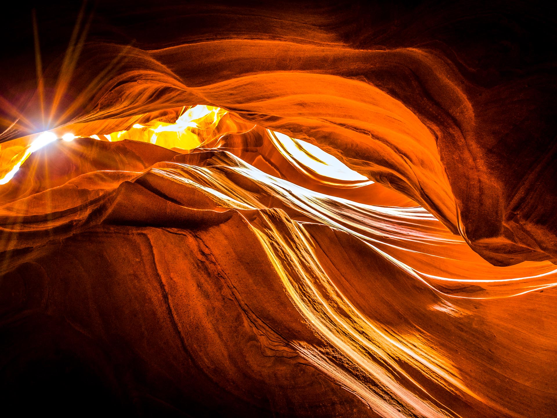 a light shining through a canyon