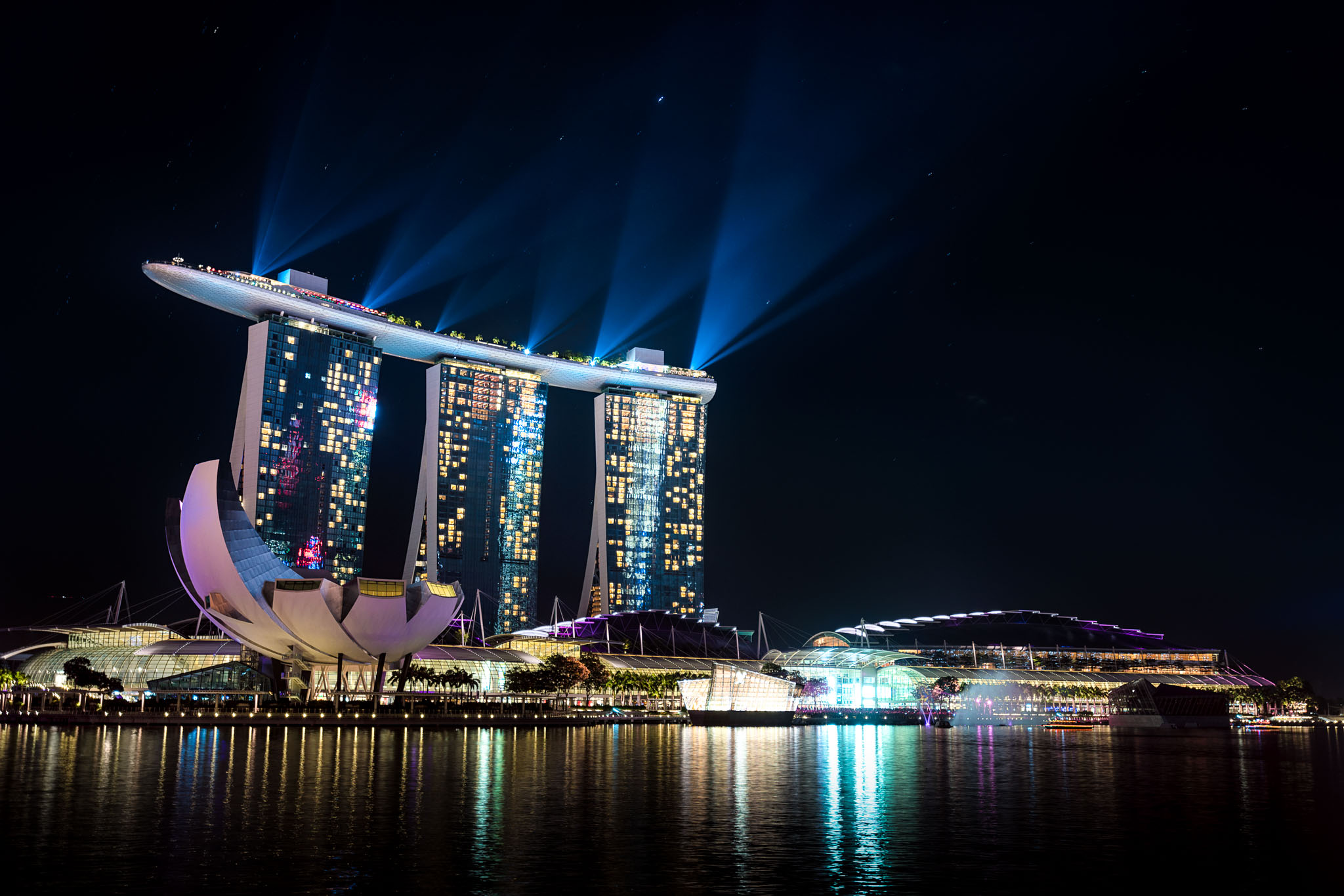 Marina Bay Sands with lights on it