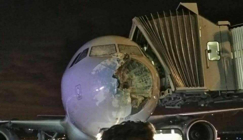 a plane with a broken front