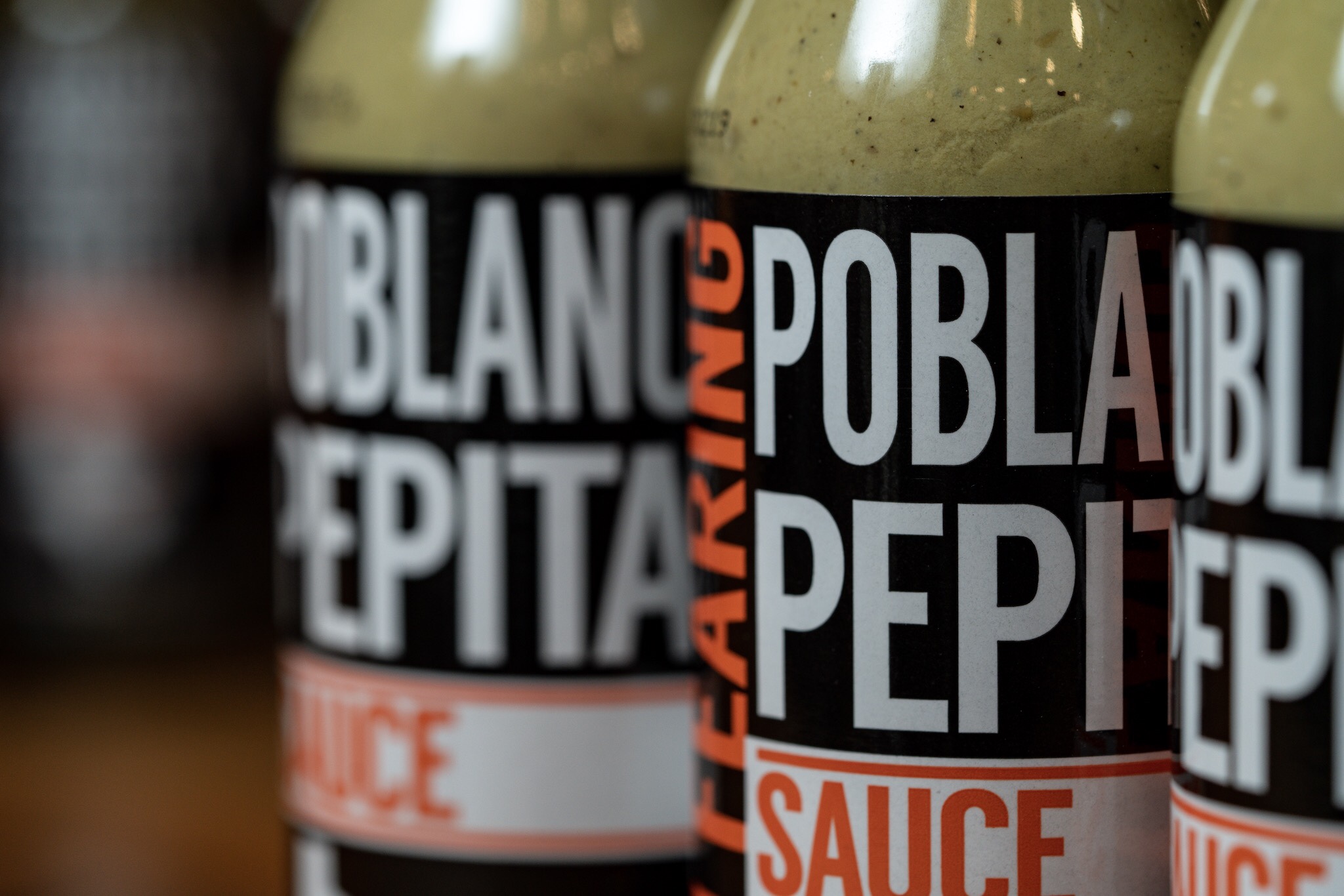 close up of a bottle of sauce