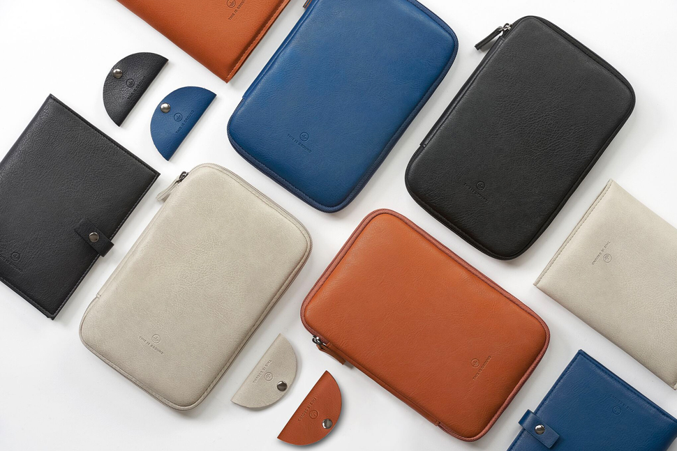 a group of different colored wallets