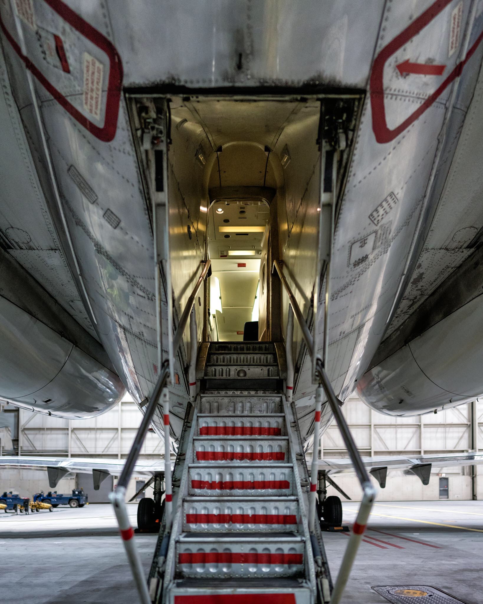 a plane with stairs leading to the door