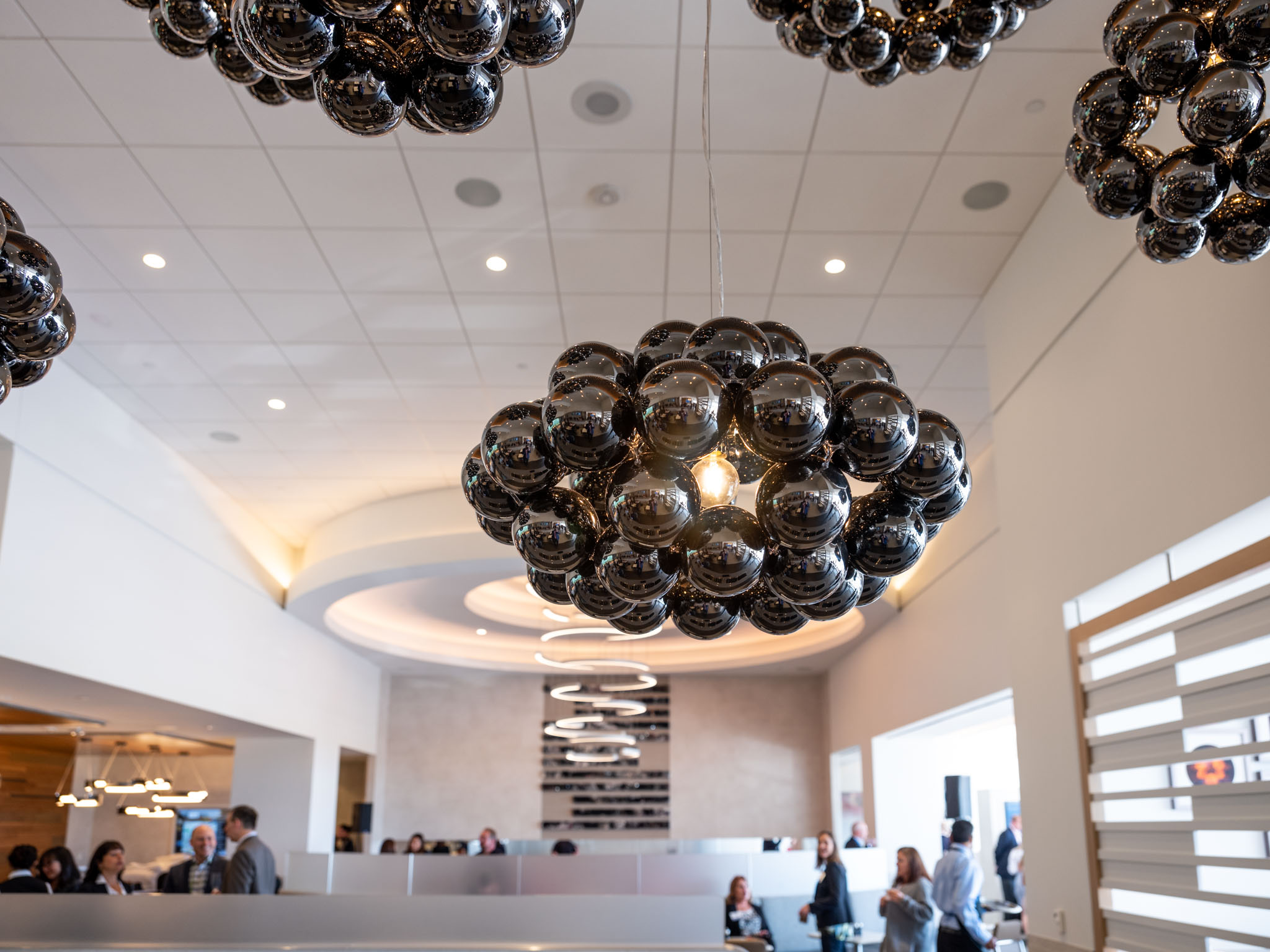 a group of black balls from the ceiling