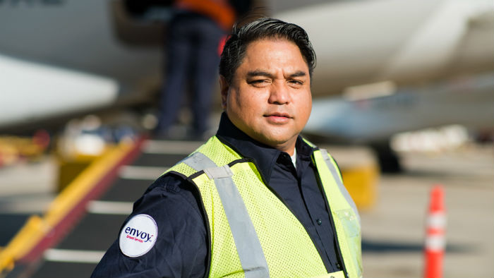 a man wearing a safety vest