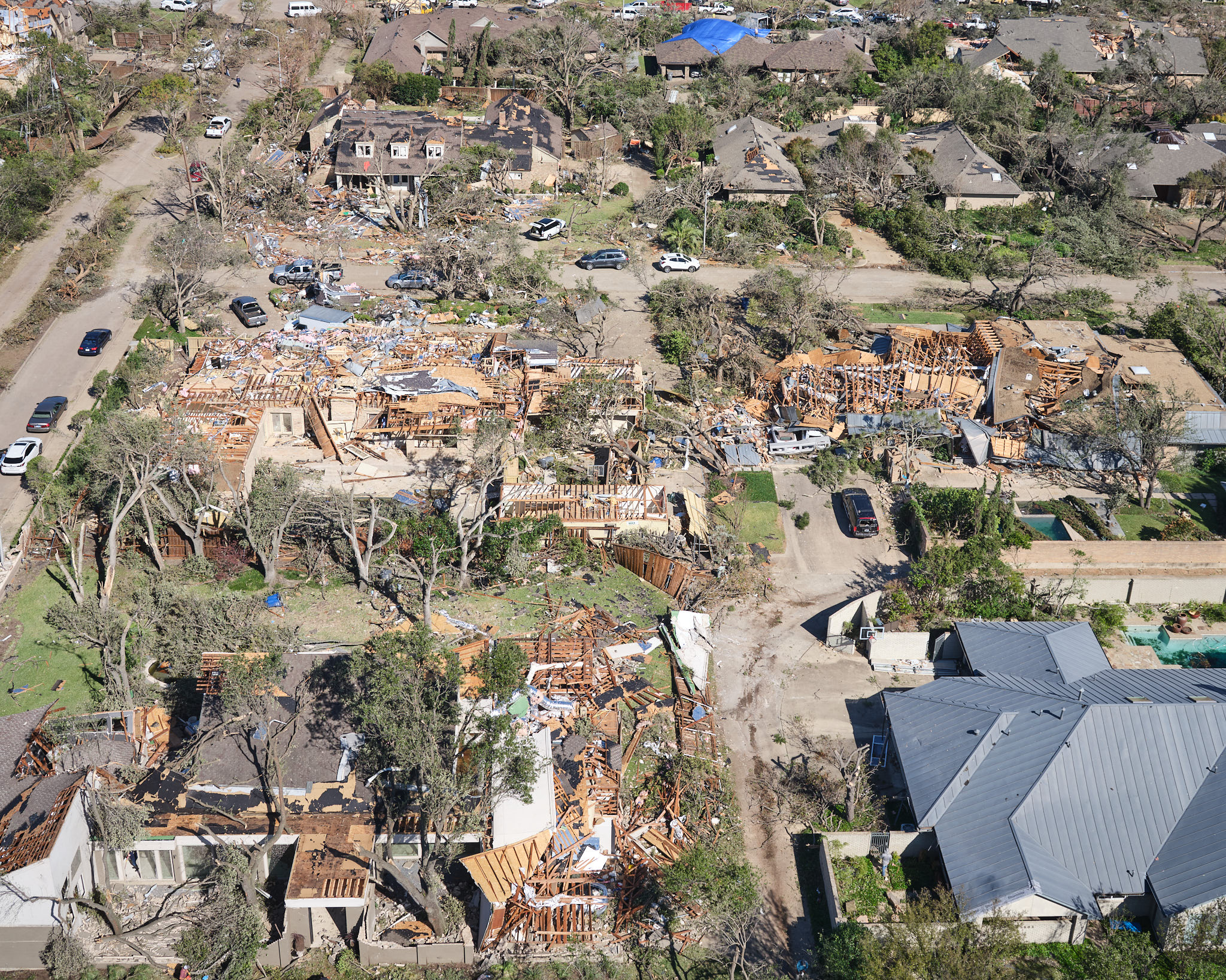 a aerial view of a destroyed neighborhood