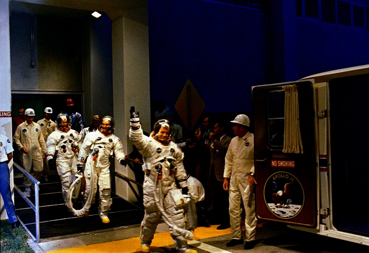 a group of people in space suits