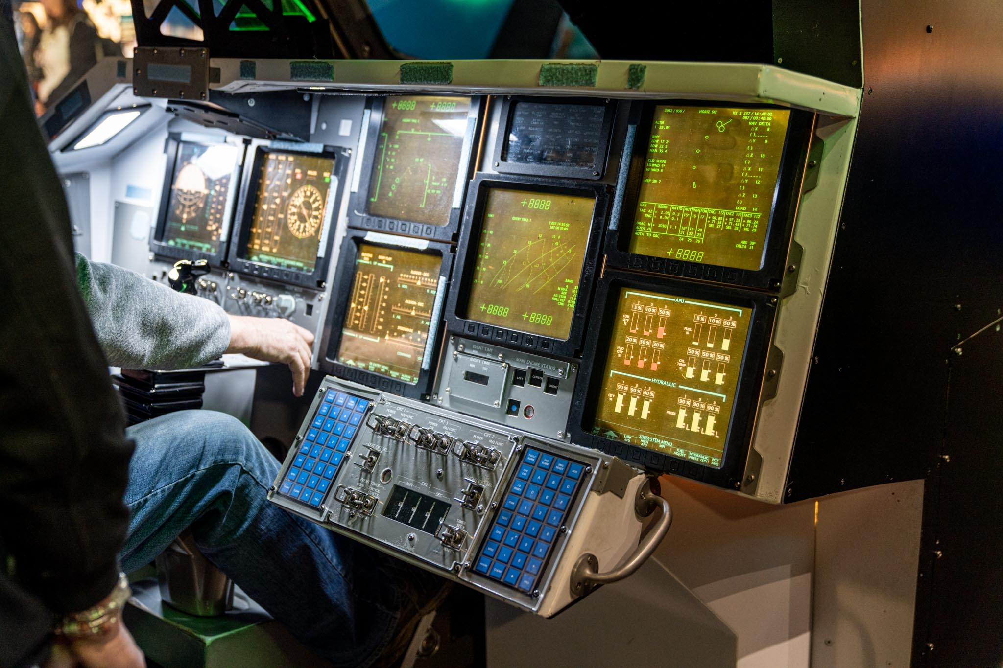 a person sitting in a control room