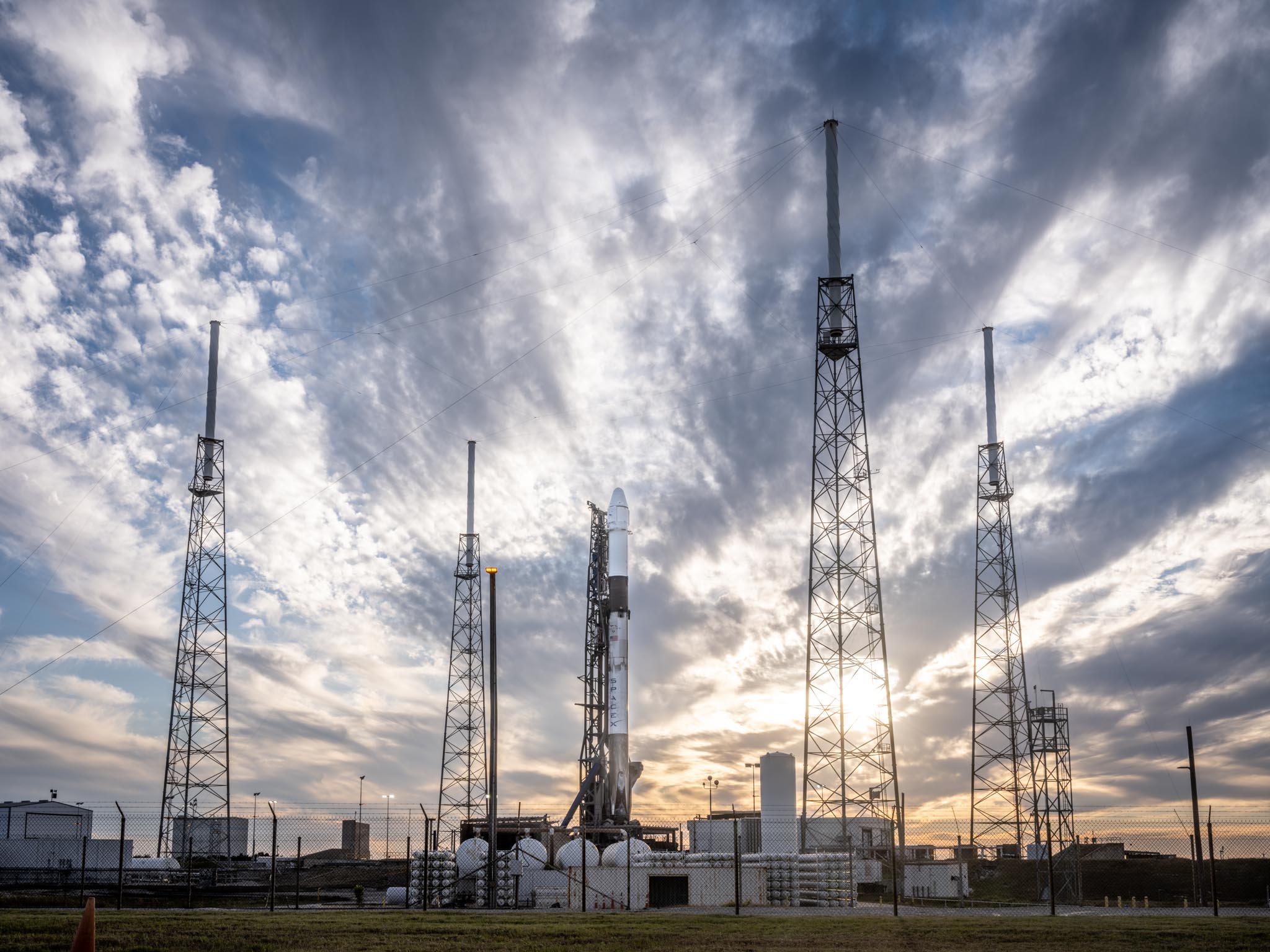 a rocket launch pad with several towers