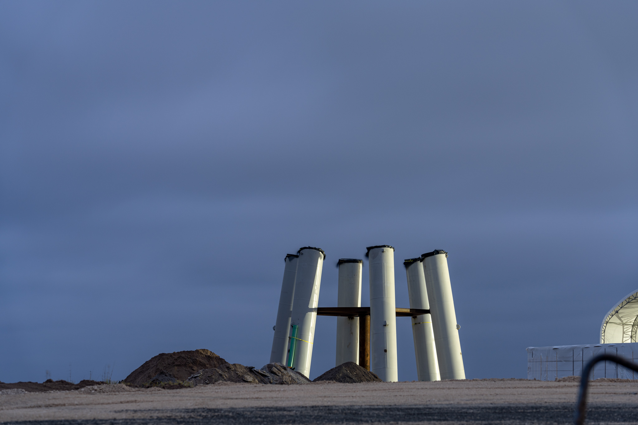 a group of white cylindrical structures